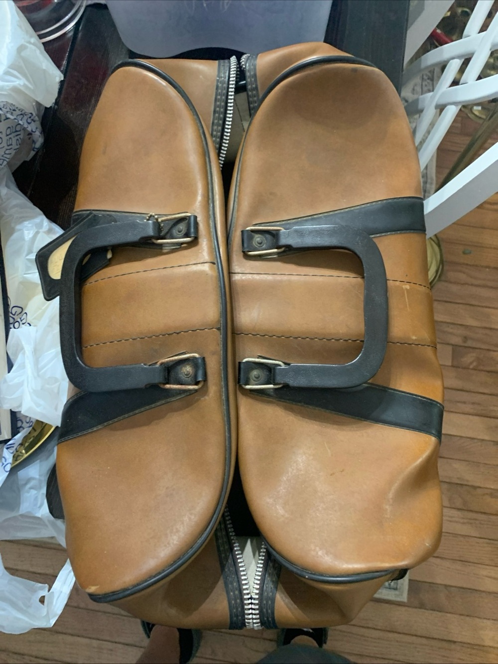 Vintage leather duffel bag.